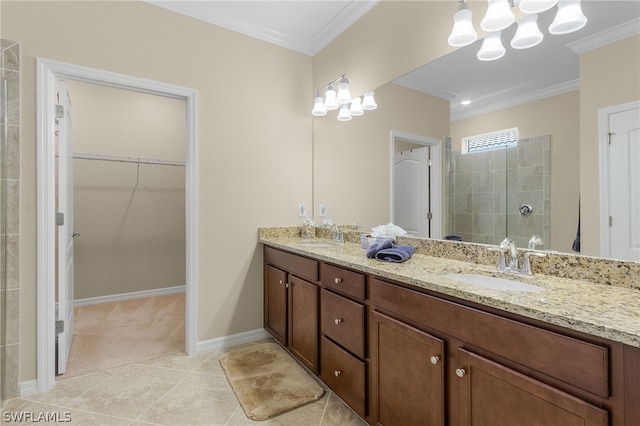 bathroom featuring a shower, vanity, crown molding, and tile patterned flooring