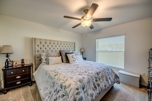 carpeted bedroom with ceiling fan