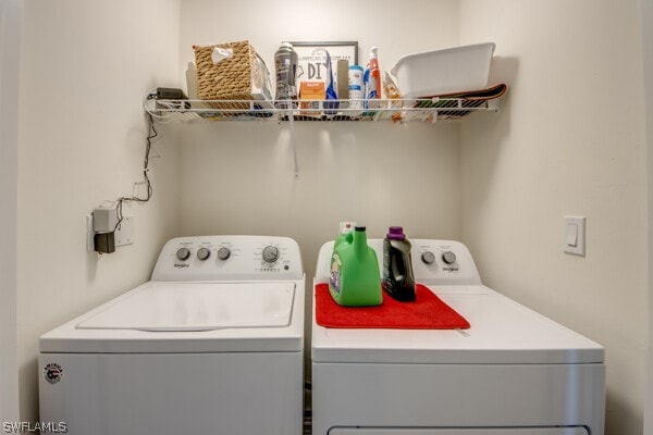 laundry area featuring independent washer and dryer