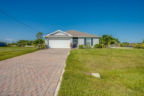 ranch-style home with a garage and a front lawn