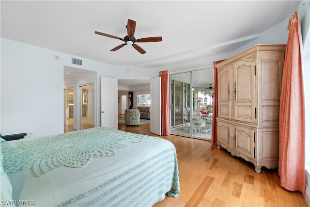 bedroom featuring light hardwood / wood-style floors, access to exterior, and ceiling fan