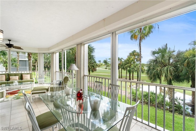 sunroom with ceiling fan