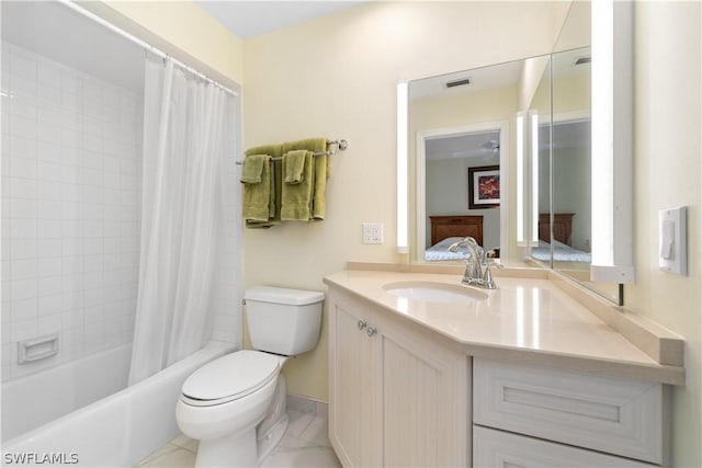 full bathroom featuring toilet, shower / tub combo, and vanity