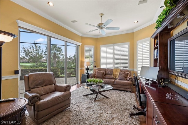 living room featuring ceiling fan, crown molding, and recessed lighting