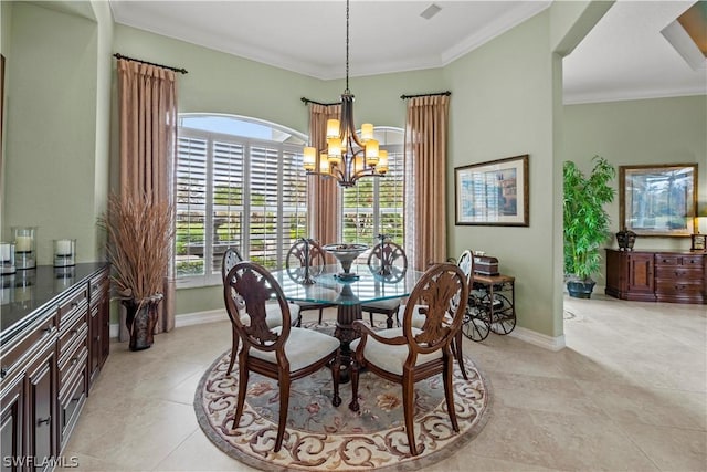 dining room featuring baseboards, ornamental molding, a notable chandelier, and light tile patterned flooring