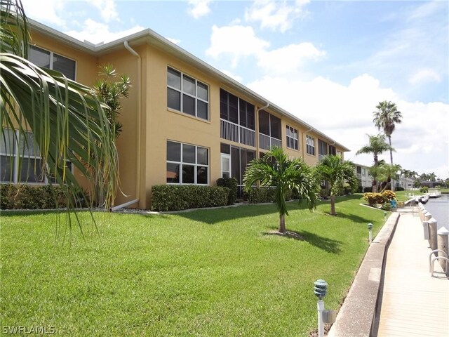 view of home's community featuring a yard