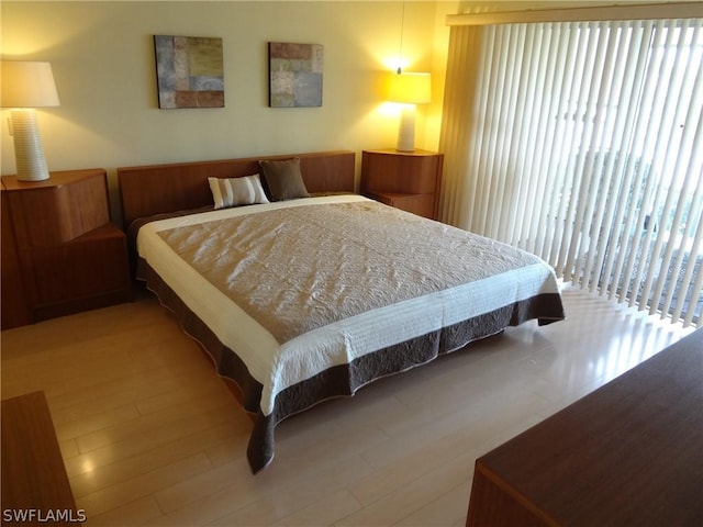 bedroom featuring wood-type flooring