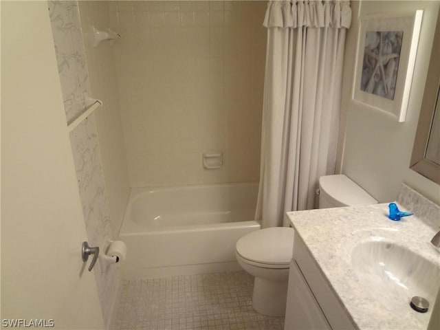 full bathroom with toilet, shower / bath combo with shower curtain, and vanity