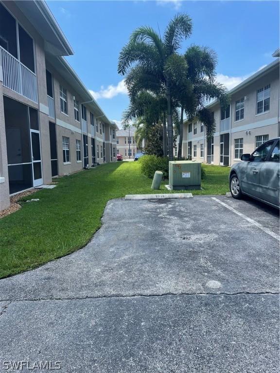 view of community featuring a lawn