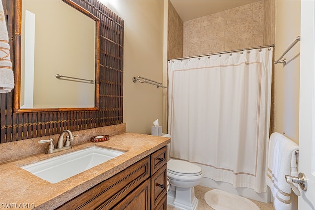 bathroom featuring a shower with curtain, toilet, and vanity