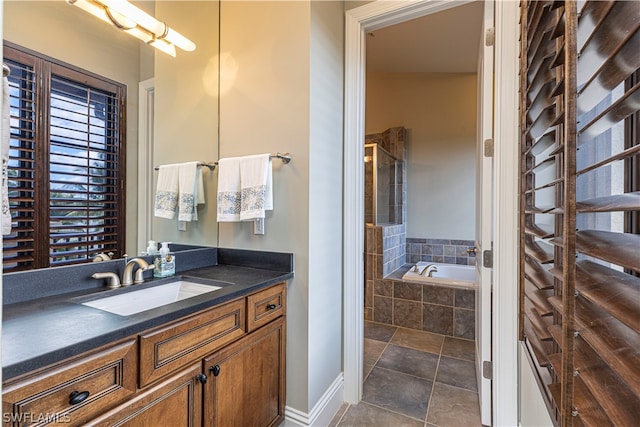 bathroom with separate shower and tub, tile patterned floors, and vanity