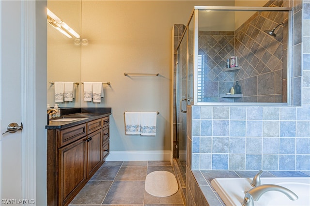 bathroom with vanity, separate shower and tub, and tile patterned flooring