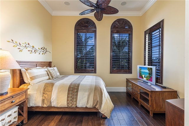 bedroom with ceiling fan, dark hardwood / wood-style flooring, and crown molding