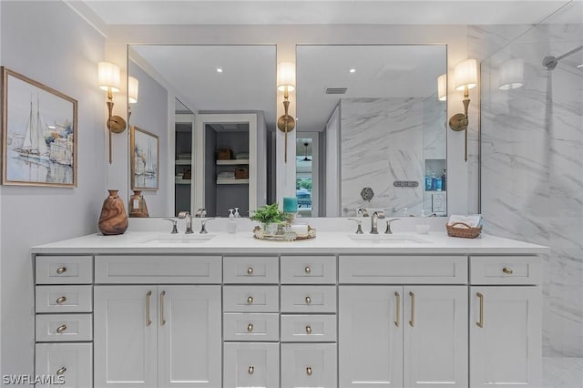 bathroom featuring vanity and a shower