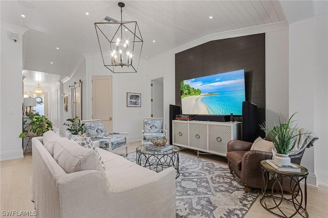 living room with wooden ceiling, light hardwood / wood-style flooring, a chandelier, and lofted ceiling