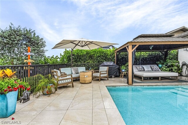 view of pool featuring a gazebo, an outdoor hangout area, grilling area, and a patio area