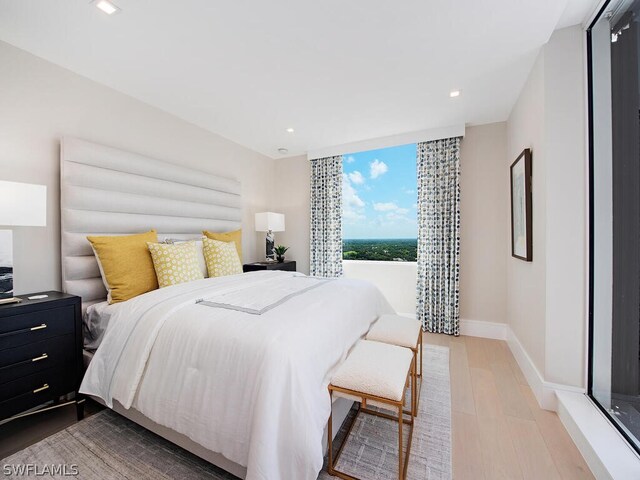 bedroom featuring light wood-type flooring