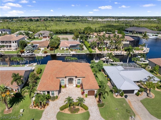 bird's eye view featuring a residential view and a water view