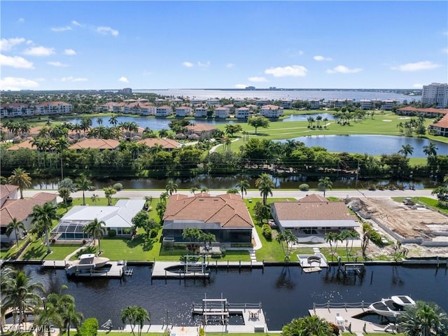 aerial view with a residential view and a water view