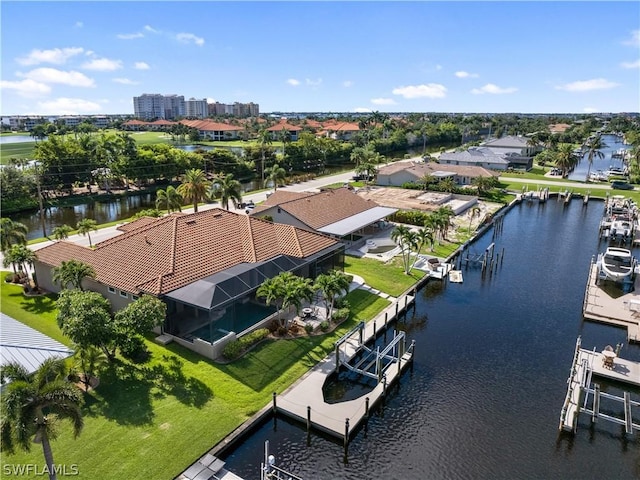 birds eye view of property featuring a water view