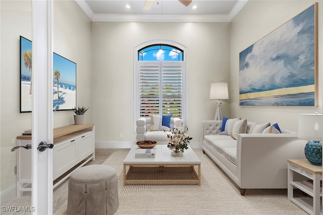 interior space with a ceiling fan, recessed lighting, crown molding, and baseboards