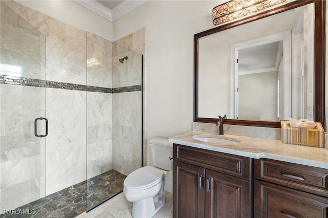 bathroom with ornamental molding, a stall shower, vanity, and toilet