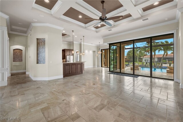 empty room featuring ornamental molding, coffered ceiling, a towering ceiling, and baseboards