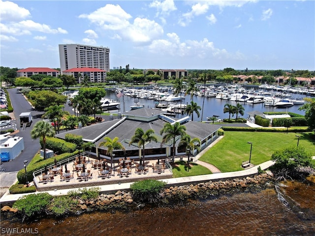 birds eye view of property with a water view