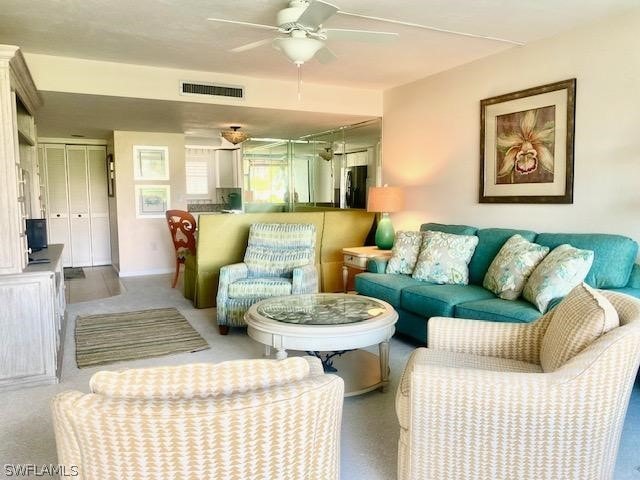 living room with ceiling fan