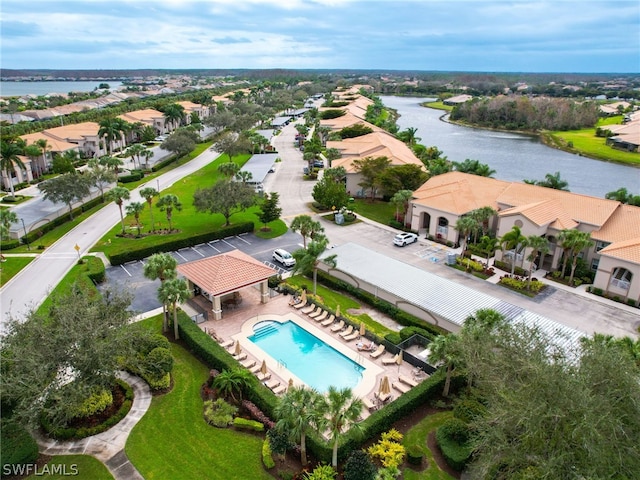 bird's eye view with a water view