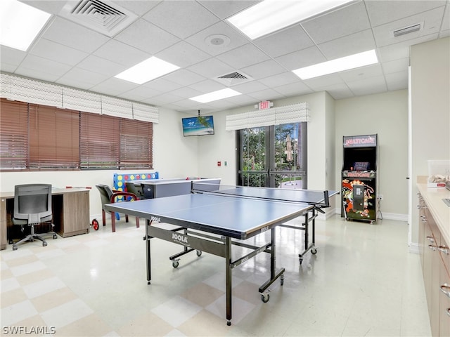 rec room featuring a paneled ceiling