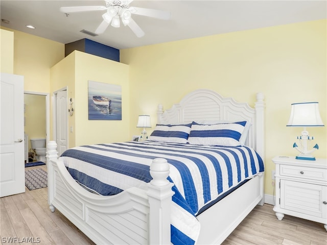 bedroom featuring light hardwood / wood-style floors and ceiling fan