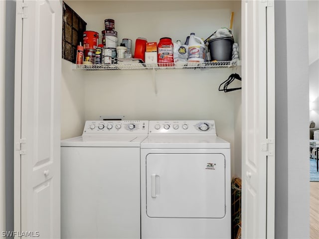 laundry room with washer and clothes dryer