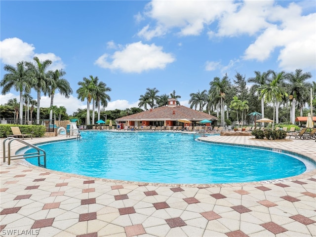 view of swimming pool featuring a patio area