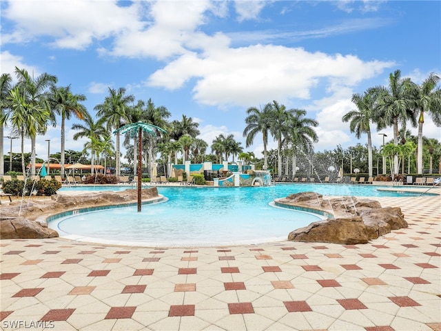 view of swimming pool featuring a patio area