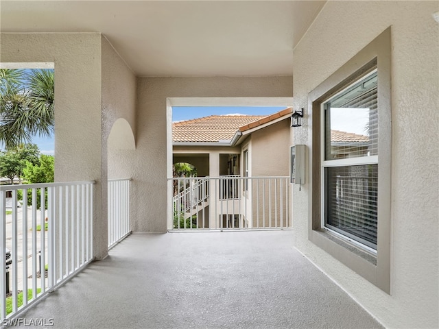 view of patio with a balcony