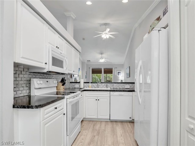 kitchen with white cabinets, white appliances, tasteful backsplash, and crown molding