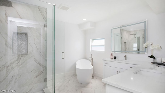 bathroom featuring shower with separate bathtub and vanity