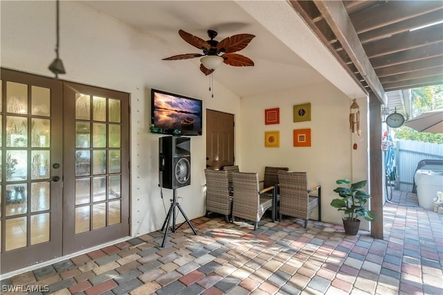 view of patio / terrace featuring ceiling fan and french doors