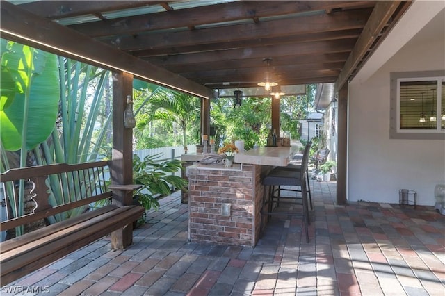 view of patio featuring a bar