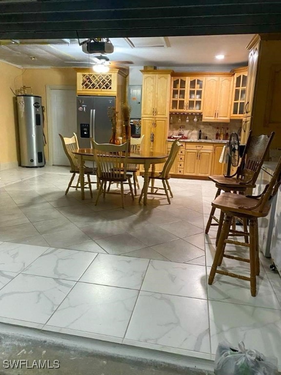 dining room featuring electric water heater