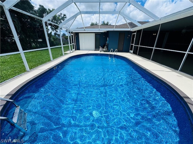 view of swimming pool with glass enclosure