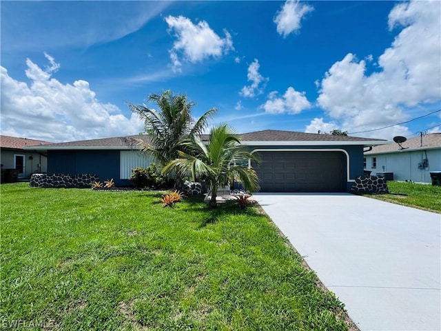 single story home featuring a front lawn and a garage