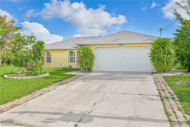 ranch-style home with a front yard and a garage