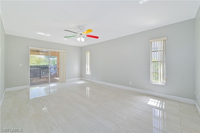 unfurnished room featuring ceiling fan