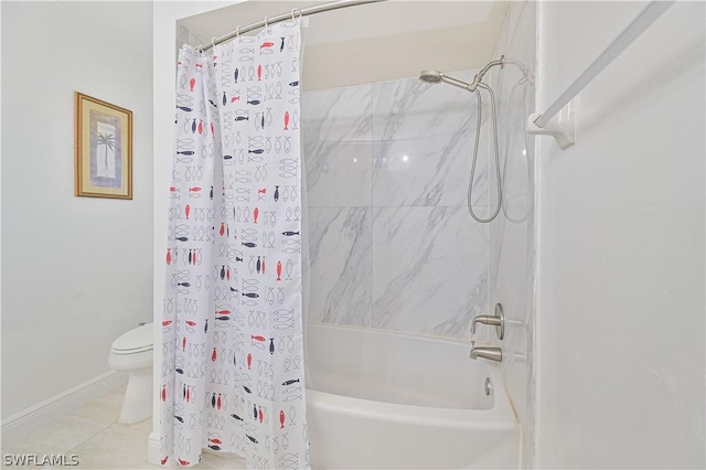 bathroom featuring tile patterned flooring, shower / tub combo, and toilet