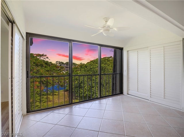 interior space featuring ceiling fan