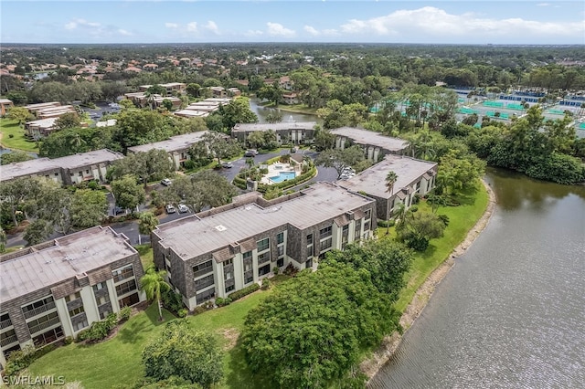 bird's eye view with a water view