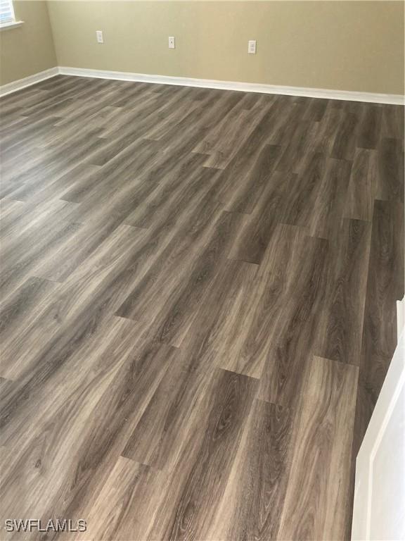 details with hardwood / wood-style flooring