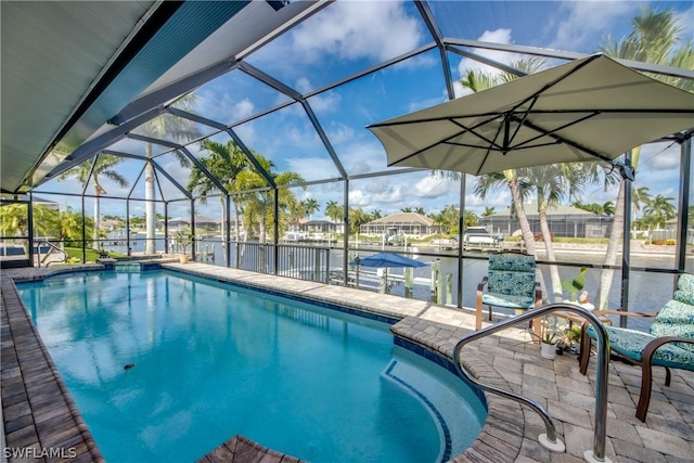 view of pool with a lanai, a water view, a dock, and a patio area